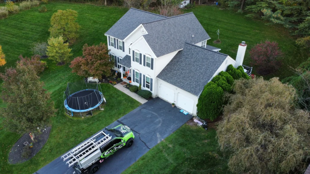 DaVinci Roofing Corp service truck parked at a completed roofing project in Fairless Hills, PA.
