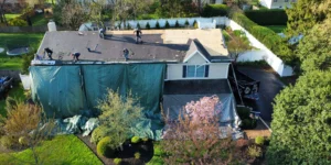 Roof tear-off in progress during a residential roof replacement in Yardley, PA.